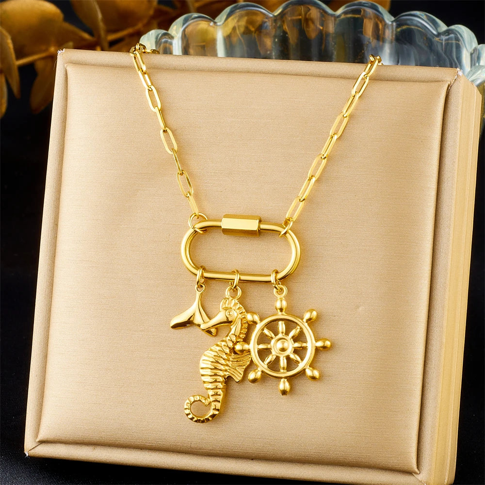 Gold seahorse and ship wheel charm necklace