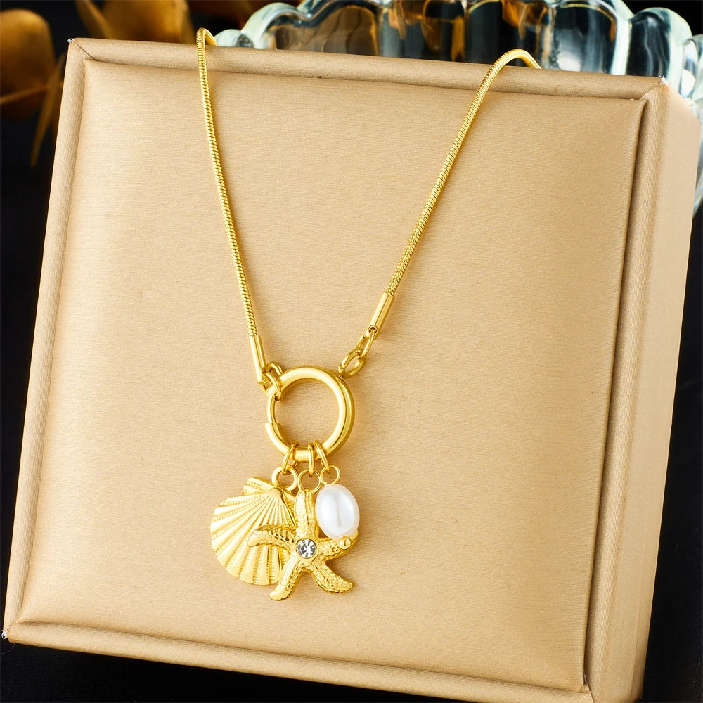 Delicate gold shell starfish and pearl necklace