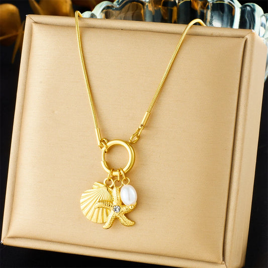 Delicate gold shell starfish and pearl necklace